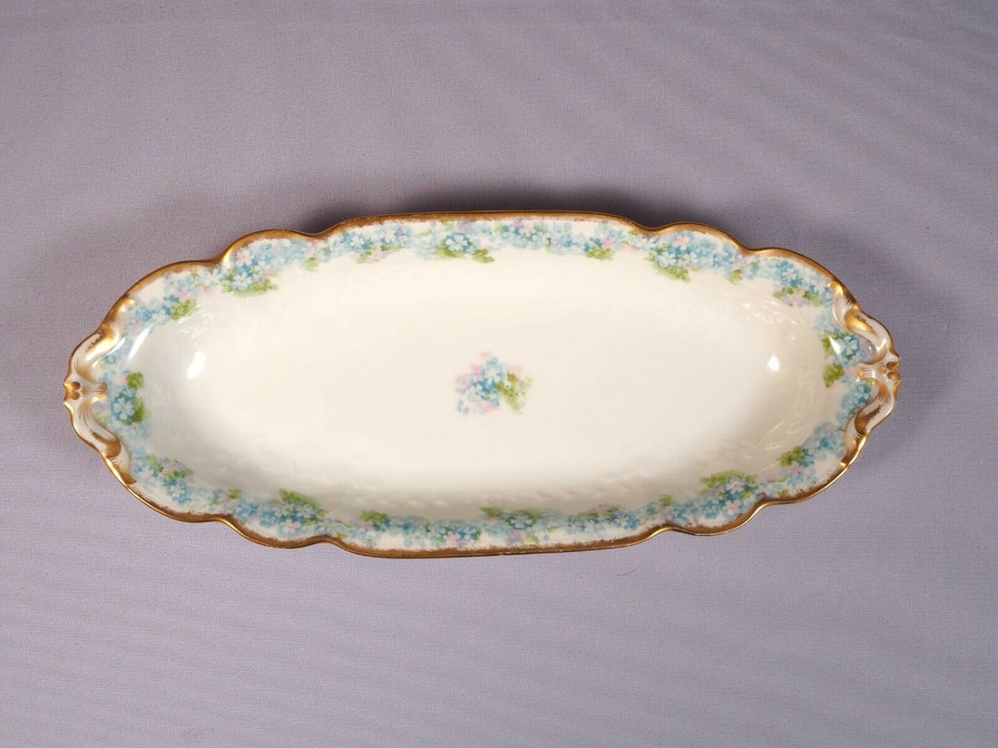 Limoges France Blue CHField Haviland GDA Celery Tray Dish CHF189: This is rare and gorgeous 1 (one) Celery Serving Tray/Dish. The tray was made in Limoges, France by GDA Haviland . The pattern features blue flowers probably forget-me-not. It has a gold rim. The tray