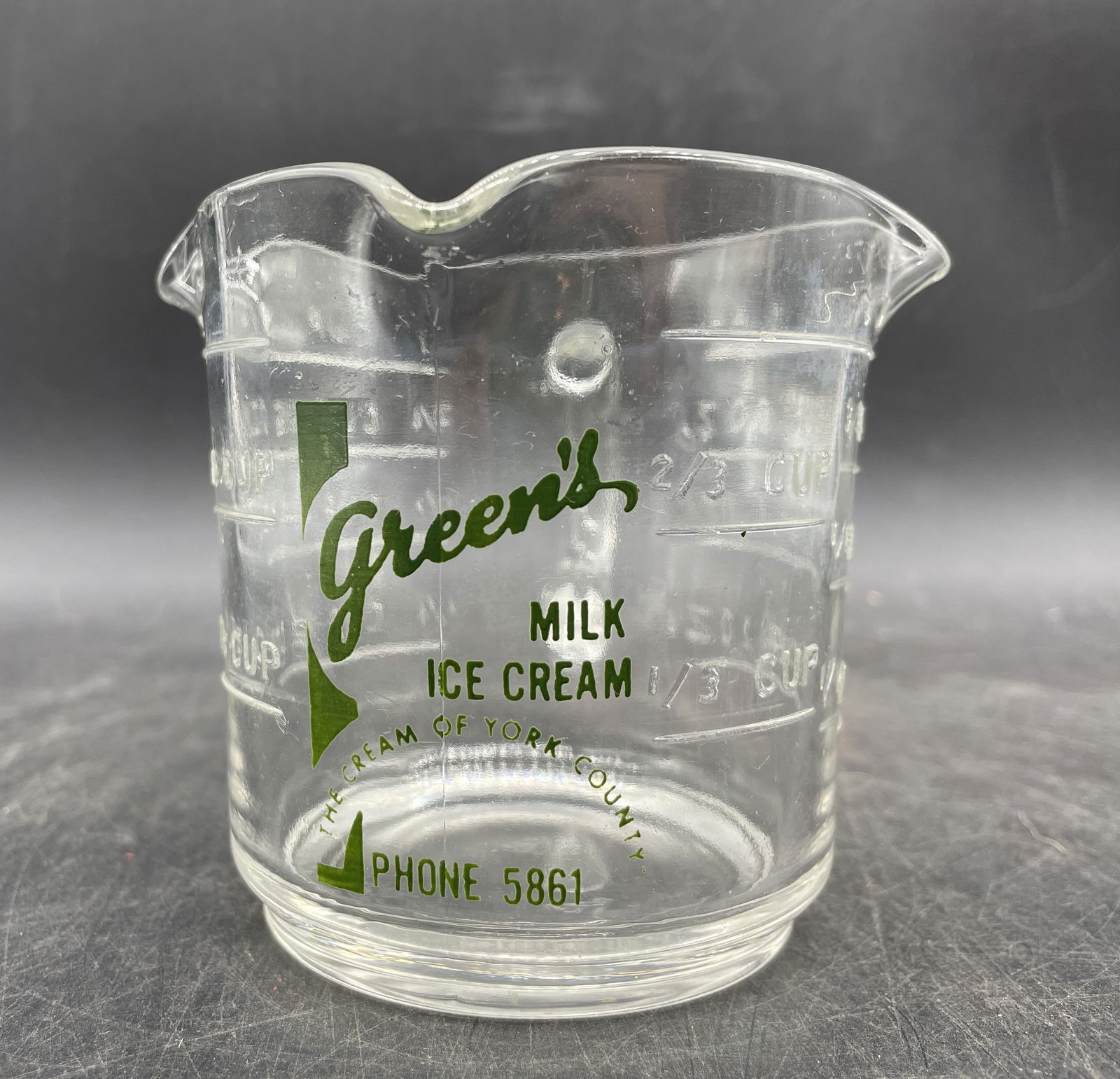 RARE FEDERAL GLASS GREENS MILK ICE CREAM- 1 CUP GLASS MEASURE YORK: Title: RARE FEDERAL GLASS GREENS MILK ICE CREAM- 1 CUP GLASS MEASURE YORK Date/Period: unknown OLD PHONE NUMBER Dimension: 1 cup measure APPROX 3.5 X 4.5 Material: glass Additional Information: Greens