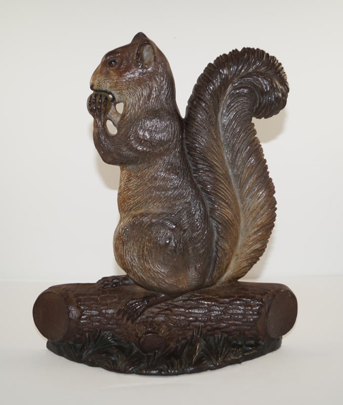 Squirrel w/ Nut Cast Iron B&H Doorstop: Title: Squirrel w/ Nut Cast Iron B&H Doorstop Dimension: 11 ½” tall x 9 7/8” wide. Date: Ca. 1920’s. Additional Information: One of our top five favorite Antique Doorstops of all