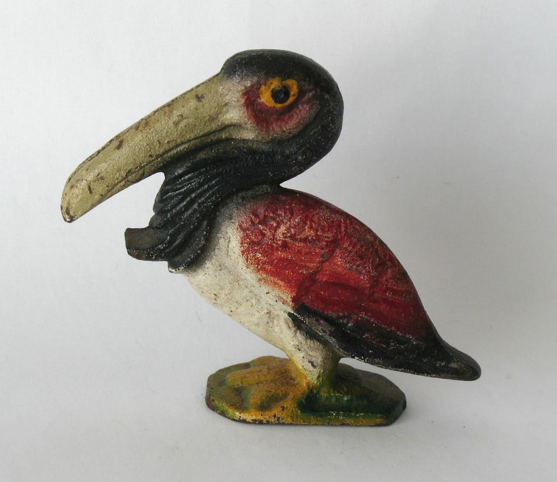 Vintage cast iron Pelican bottle open. (1 of 3)