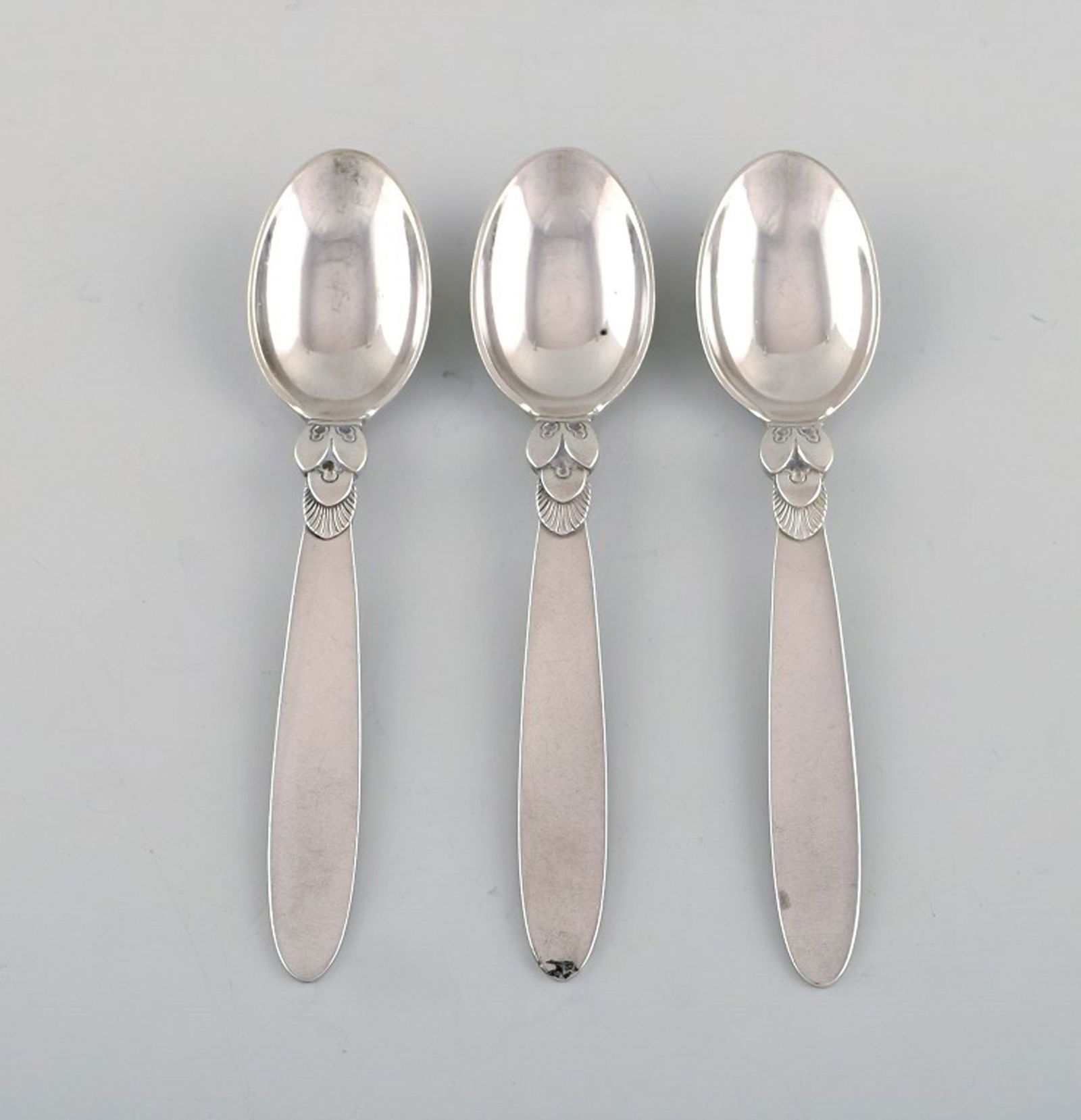 Three Georg Jensen Cactus coffee spoons in sterling silver.: Three Georg Jensen Cactus coffee spoons in sterling silver. Designer: Gundorph Albertus. Measures: 10.5 cm. Stamped. In good condition. Reserve: $119.00 Shipping: Domestic: Shipping rates are determin