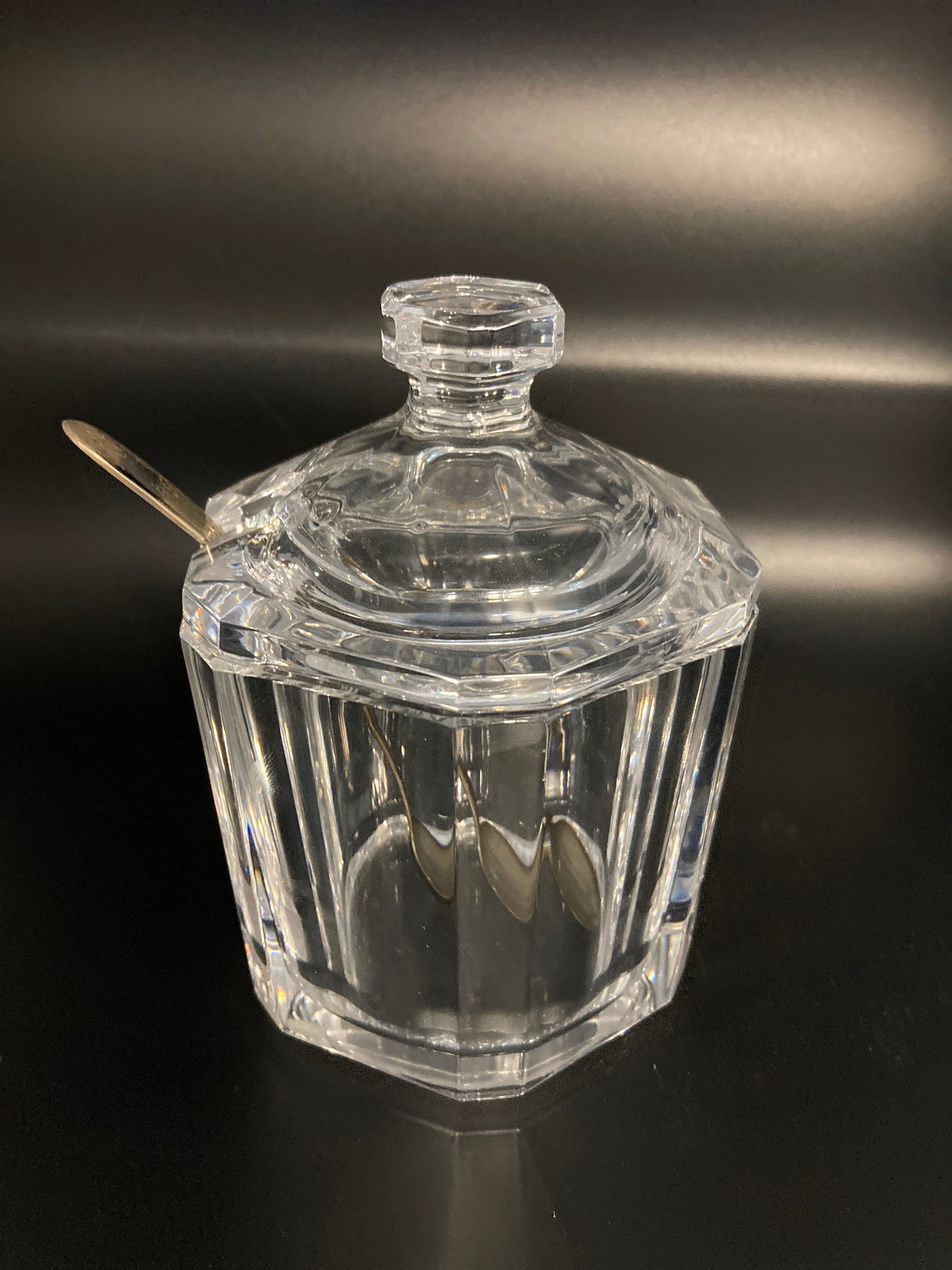 Heavy Orrefors Lidded Dish with Sterling Spoon: Title: Heavy Orrefors Lidded Dish with Sterling Spoon Maker: Orrefors Origin: Sweden Date/Period: 1950-1999 Materials: Glass/Crystal Size:4"w x 5"t Description: Vintage Heavy Orrefors Sweden Cut Cryst