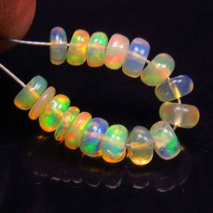 2.93 Ctw Natural 17 Ethiopian Drilled Fire Opal Beads: No Reserve! Title: 2.93 Ctw Natural 17 Ethiopian Drilled Fire Opal Beads Stone Clarity: Transparent Gemstone:Natural Fire Opal Beads Carat Weights: 2.93 Size/Dimensions: 3.80 to 4.20 mm / 17 PC's Addi