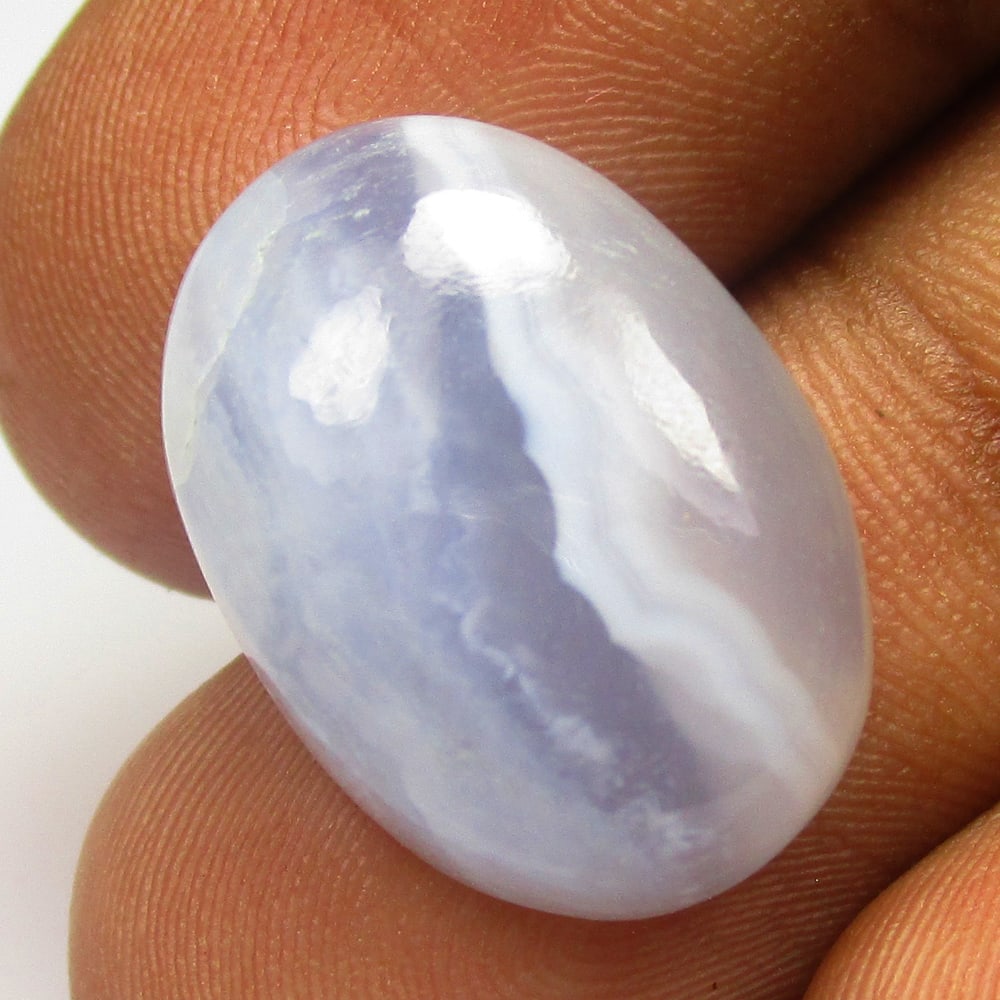 14.91 Ctw Natural Blue Lace Agate Oval Cab: No Reserve! Title: 14.91 Ctw Natural Blue Lace Agate Oval Cab Stone Clarity: Opaque Gemstone:Natural Lace Agate Carat Weights: 14.91 Size/Dimensions: 19.20 x 13.50 x 7.00 mm Additional Info:Excellent 