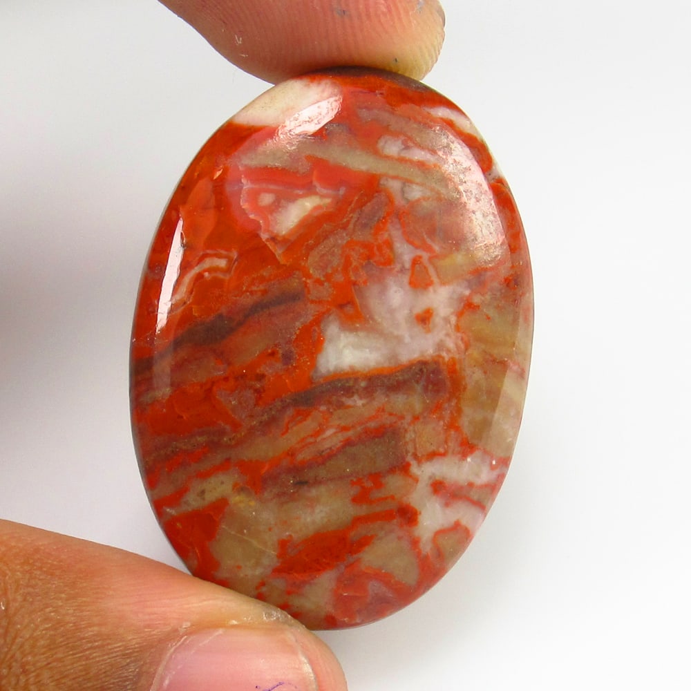 Natural Red Jasper - 48.31 Ct: No Reserve! Title: Natural Red Jasper - 48.31 Ct Origin: Brazil Weight:48.31 Size/Dimensions: 38.0 x 26.0 x 6.0 mm Description: Pieces : 1 No's / Shape : Oval Cabochon / Color : Red / Clarity : Opaque