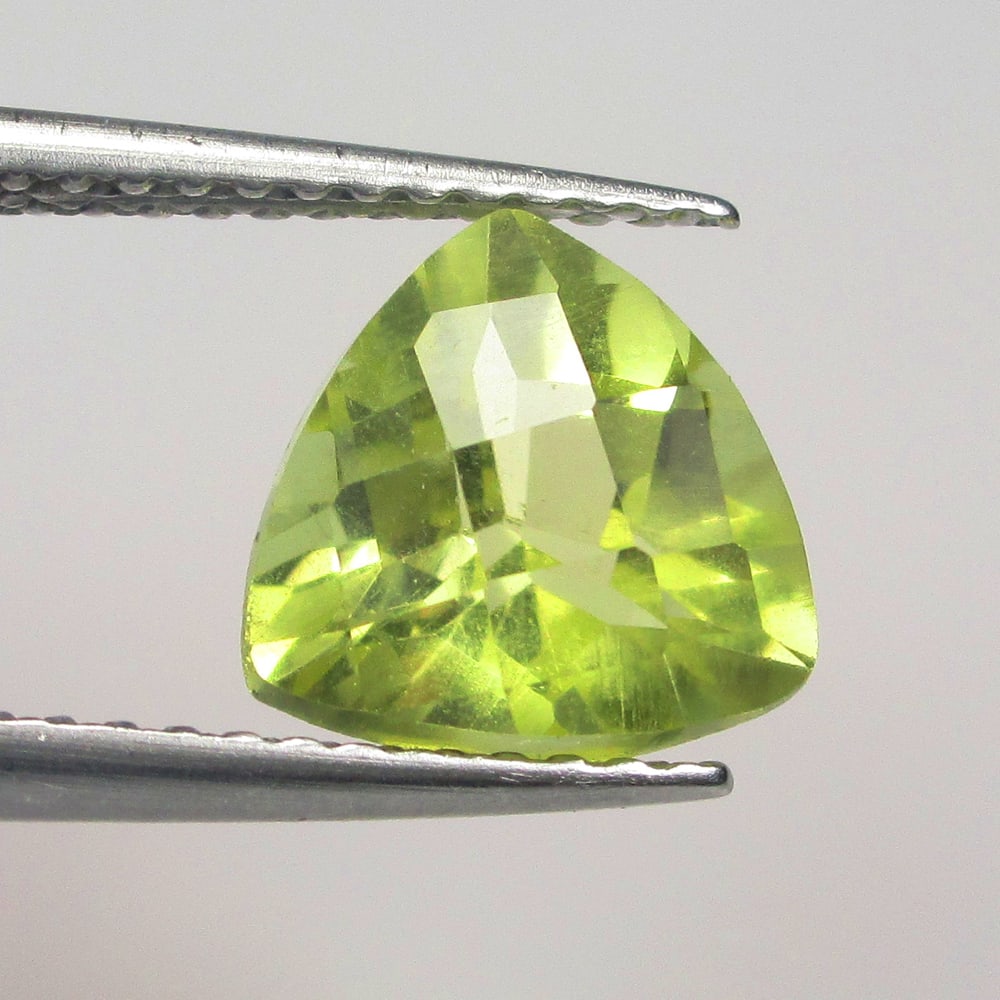 1.90 Ctw Natural Lemon Quartz Trillion Cut: No Reserve! Title: 1.90 Ctw Natural Lemon Quartz Trillion Cut Stone Clarity: VVS Gemstone:Natural Lemon Quartz Carat Weights: 1.9 Size/Dimensions: 8.30 x 8.30 x 5.50 mm Additional Info:Good Luster / T