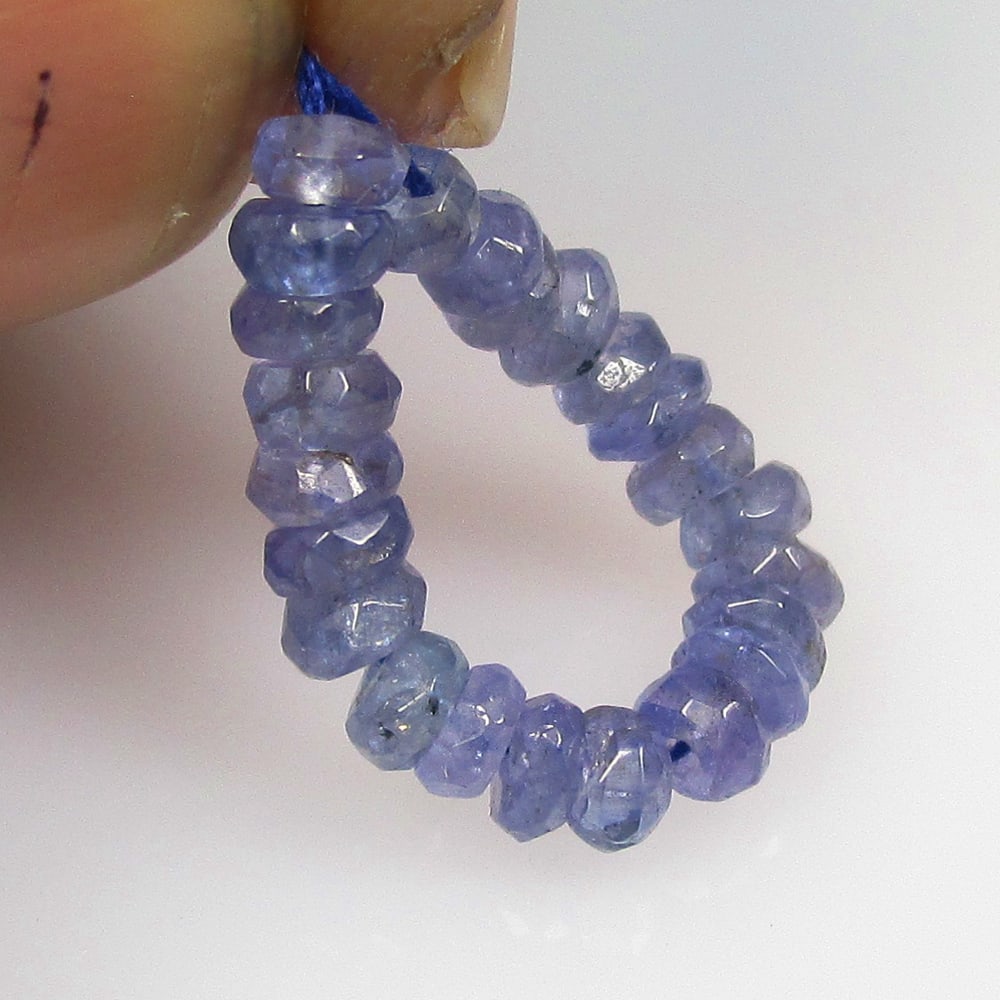 4.13 Ctw Natural 23 Drilled Tanzanite Round Beads: No Reserve! Title: 4.13 Ctw Natural 23 Drilled Tanzanite Round Beads Stone Clarity: Transparent Gemstone:Natural Tanzanite Beads Carat Weights: 4.13 Size/Dimensions: 3.10 - 3.60 mm / 23 Pc's Additiona