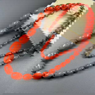 Art Deco Coral Red Bakelite Antique Original "WIRE STRUNG" Faturan Graduated Bead Necklace: Title: Art Deco Coral Red Bakelite Antique Original "WIRE STRUNG" Faturan Graduated Bead Necklace Date/Period: 1920-1930 Materials: Material: Coral Red Bakelite Dimensions: Weight: 66g Length: 89cm La