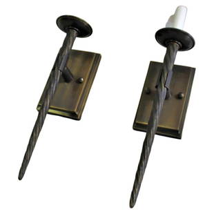 Mid-Century Modern Sconces, Bronze Tusk Pair: A very detailed casting of a Narwhal point custom made by an LA Lighting Designer. Solid castings with a medium Bronze acid patina finish. Single arm and Candelabra socket with 4" covers. Backplate