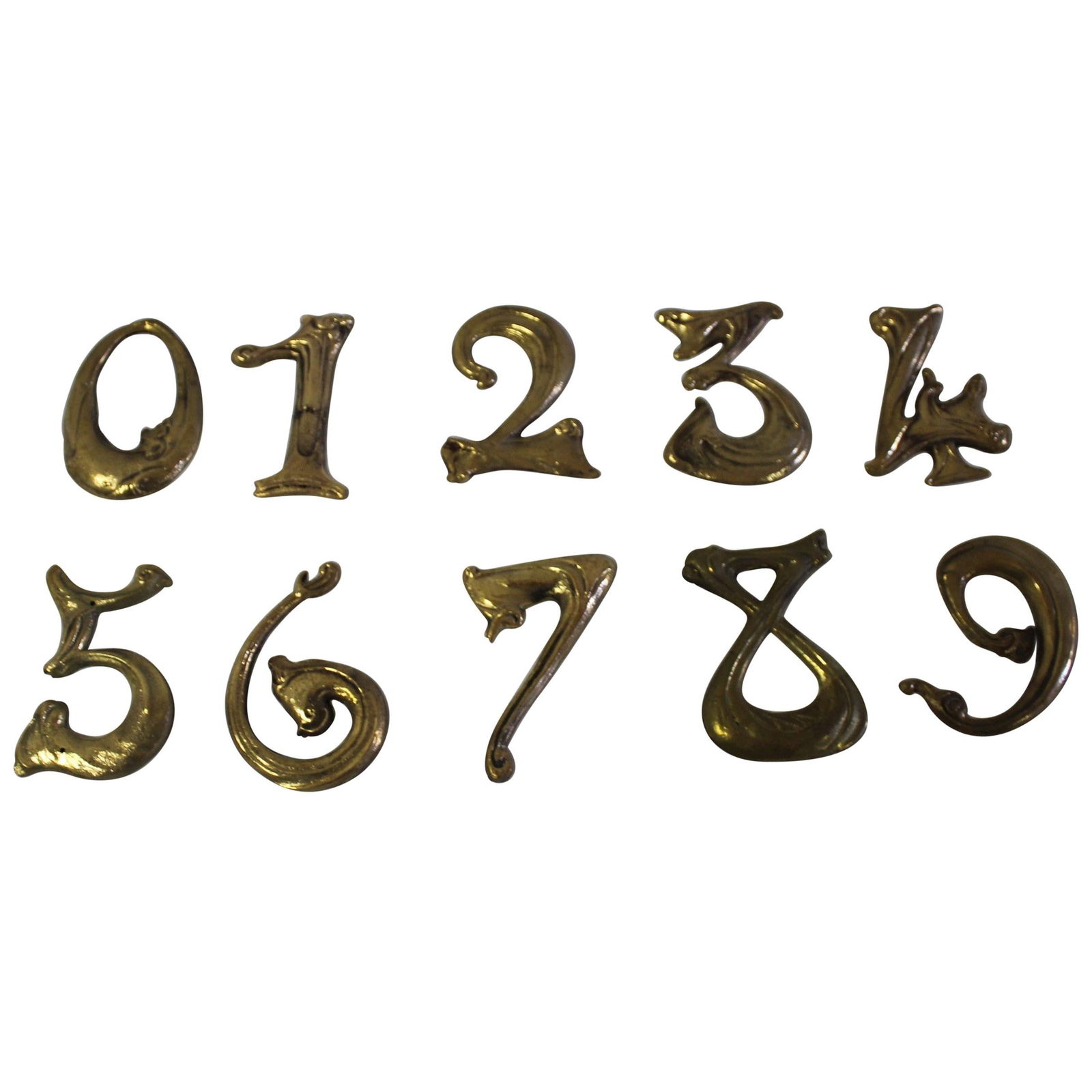 Art Nouveau House Numbers Bronze Made after Hector Guimard Designs: Art Nouveau bronze numbers cast in bronze from the design of Hector Guimard from France. They are priced ( Each ) We have many of them . Let us know which one's you are interested in . Very rare to fi
