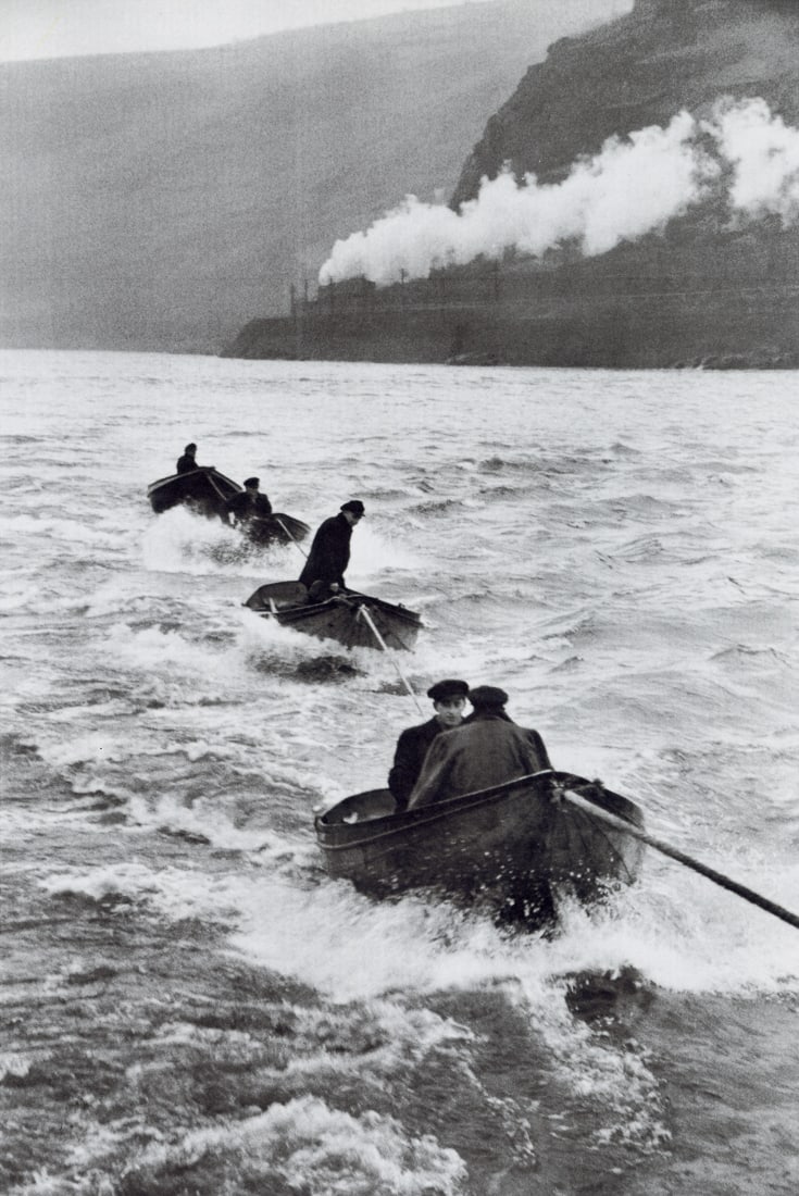 HENRI CARTIER-BRESSON - Tugboat Pilots on the Rhine: Artist: Henri Cartier-Bresson Title: Tugboat Pilots on the Rhine Near Bingen, Federal Republic of Germany, 1956 Medium: Photoengraving, 1999, Germany Dimensions: 8.05x12.05" Description: Heat Wax Moun