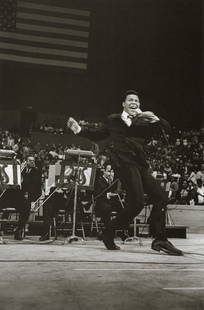 JIM MARSHALL - Chubby Checker Doing the Twist, 1960: Artist: Jim Marshall Title: Chubby Checker Doing the Twist, 1960 Medium: Photo Litho, 2000, Italy Dimensions: 5.55x8.4" Description: Heat Wax Mounted on 8.5x11" Conservation Board Artist Bio: James Jo