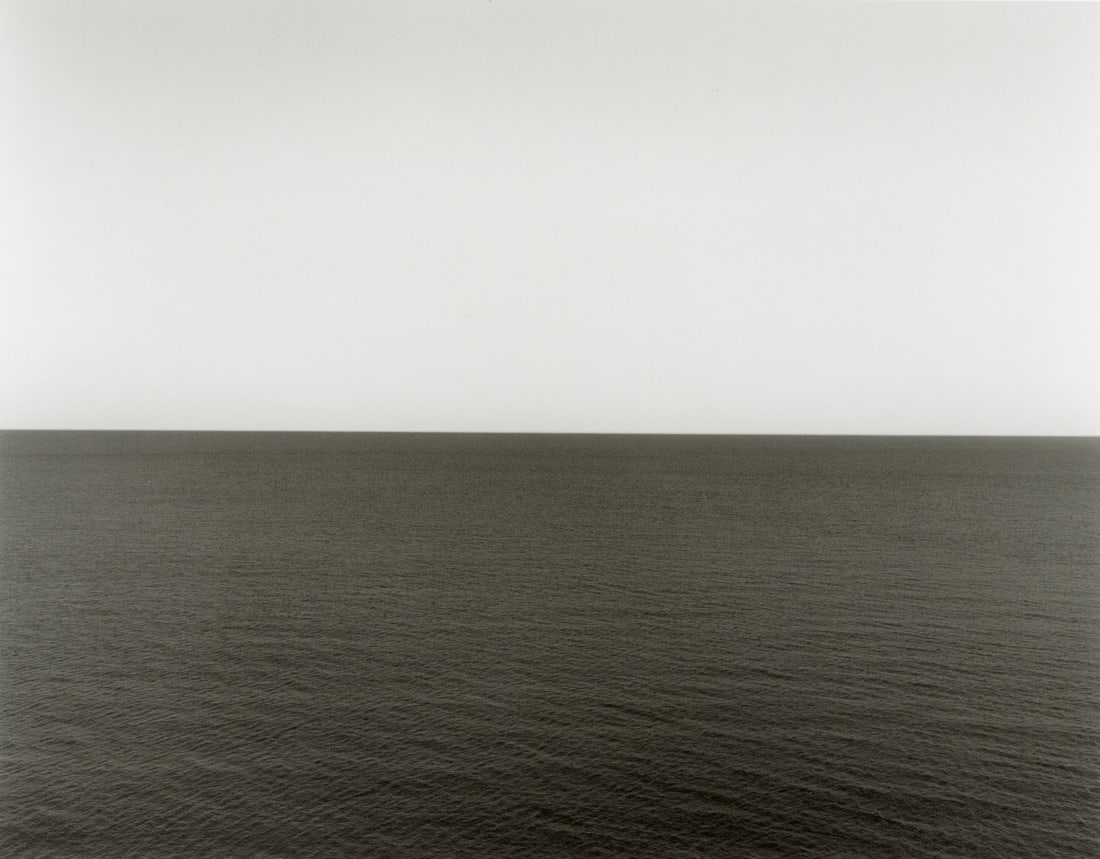 HIROSHI SUGIMOTO - Caribbean Sea, Jamaica, 1980: Artist: Hiroshi Sugimoto Title: Caribbean Sea, Jamaica, 1980 (Neg. #574) Medium: Photo Litho, 2019, Italy Dimensions: 8.45x6.6" Description: Heat Wax Mounted on 8.5x11" Conservation Board Artist Bio: 