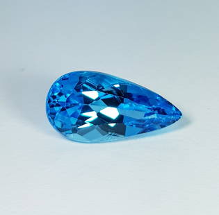 7.55 ctz Natural Swiss Blue Topaz Pear Cut: Title: 7.55 ctz Natural Swiss Blue Topaz Pear Cut Gemstones: Blue Topaz Color/Clarity: Blue / VVS Carat Weights: 7.55 Size: 16.60 x 8.60 x 7.30 Additional Information: Pear - Brazil Reserve: $76.00 Sh