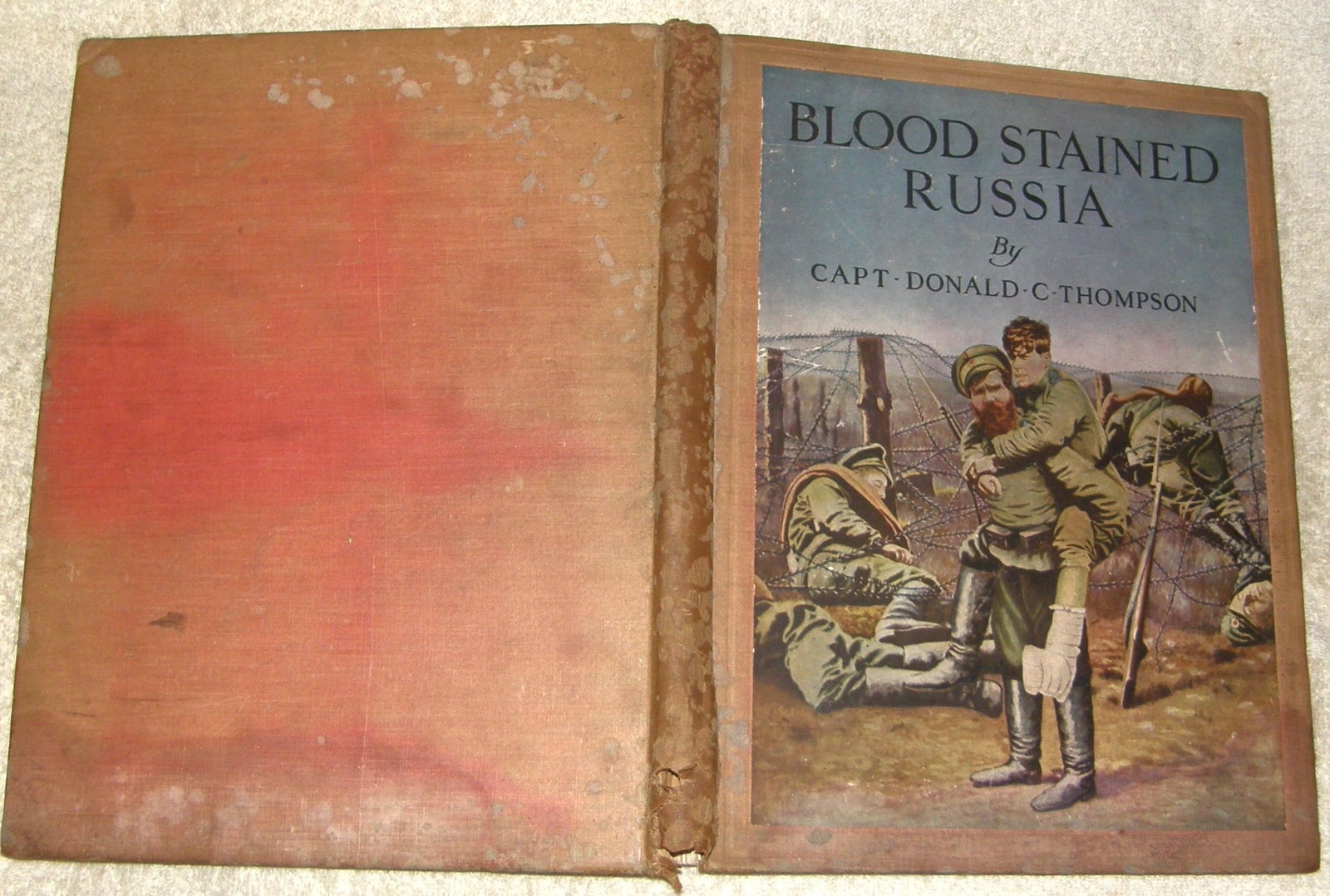 BLOOD STAINED RUSSIA by Capt Donald Thompson 1910: Photo book well illustrating the Bolshevik Revolution and its immediate aftermath. And also the Labor uprisng at Petrograd. And not to forget the WW1 battles against the Germans. So the year 1917 - 19