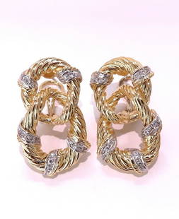 .50ct. natural round diamond loop link earrings 18kt clip: Loop link diamond earrings. .50 carat natural round diamonds G color vs2 clarity 18kt yellow gold 22 grams Earring measure 32 x19 mm Depth: 7.3mm Comfortable omega clip $11,000 appraisal certificate t