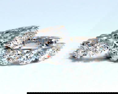 1.30ct Natural Round Diamond hoop earrings 14kt 16mm single share prong: Dime sized natural diamond hoop earrings. Single sharing prong design 1.30 carat round brilliant diamonds G color vs2 clarity 14 karat white gold 4.7 g 16.5 mm wide front to back 3.3 mm thick at Diamo