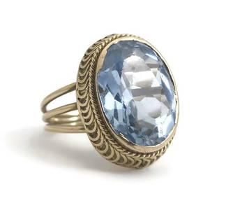 Vintage Handmade Oval Blue Topaz Cocktail Ring 18K Yellow Gold 12 CT, 6.46 Grams: Vintage Handmade Oval Blue Topaz Cocktail Ring 18K Yellow Gold 12 CT, 6.46 Grams This ring is a a real beauty. A gorgeous estate piece! One-of-a-kind, designer ring! Priced to sell fast! Gemstone: