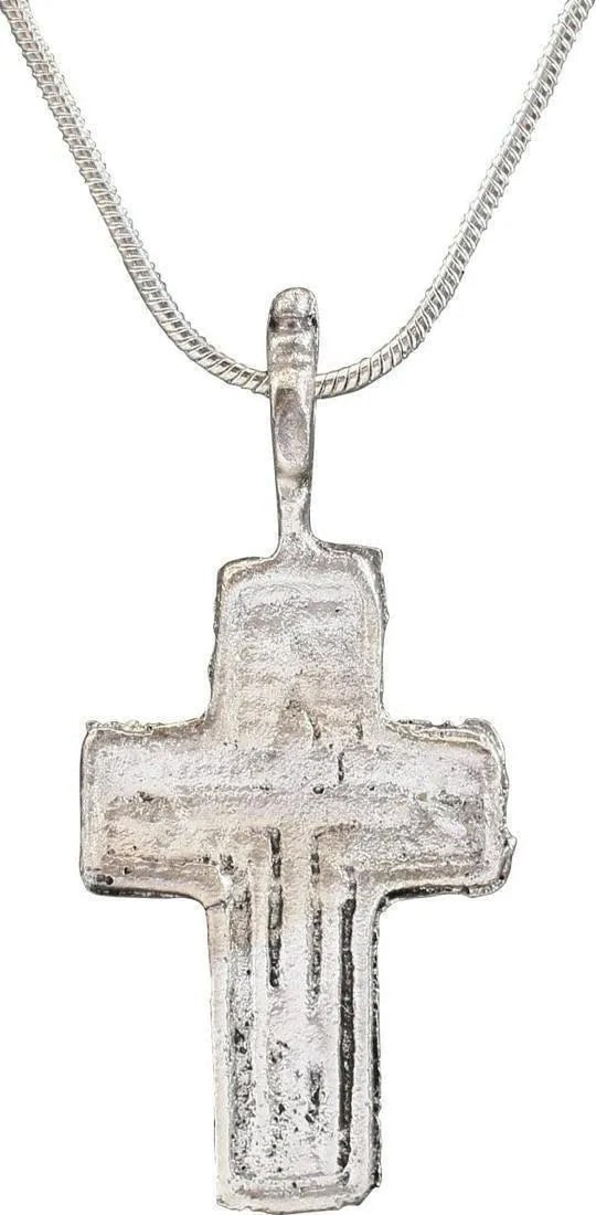 EASTERN EUROPEAN CHRISTIAN CROSS NECKLACE: 17th-18th century, Polish, Russian or Ukrainian. Orthodox rite. Silvered bronze, over 1 1/8" height plus the suspension loop. Relief decoration with raised borders and central cross surrounded by Cyri