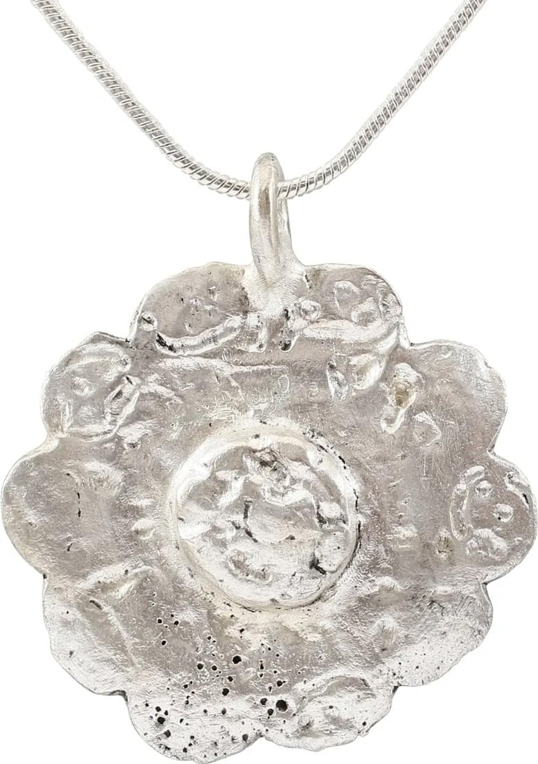 ROMAN WHEEL OF FORTUNE AMULET NECKLACE, 3RD-6TH CENTURY AD: The Wheel of Fortune (Rota Fortuna) is one of the most enduring of ancient philosophical or religious concepts. It was pivotal in Ancient Greek and Roman Paganism and smoothly transitioned into Christ