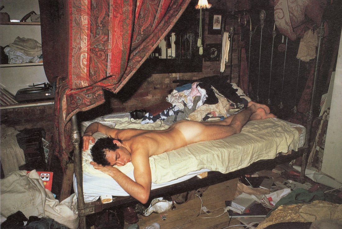 NAN GOLDIN - Kenny in his Room, NYC, 1979: Artist: Nan Goldin Title: Kenny in his Room, NYC, 1979 Medium: Sheet Fed Gravure, 1989, Switzerland Dimensions: 7.05x4.7" Description: Heat Wax Mounted on 8.5x11" Conservation Board Artist Bio: Nancy 