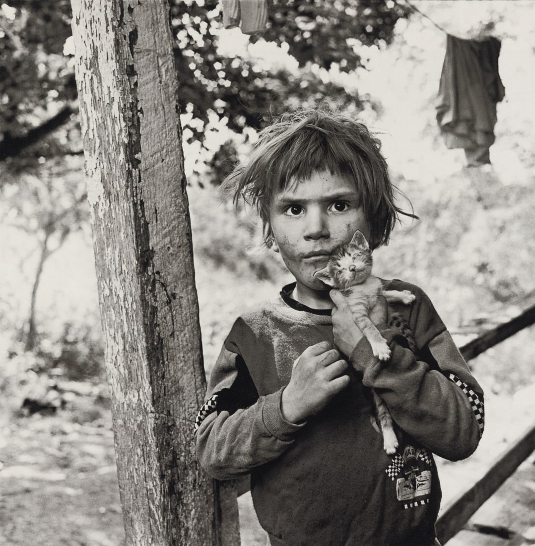 MARY ELLEN MARK - Christopher, Sandgap, Kentucky: Artist: Mary Ellen Mark Title: Christopher, Sandgap, Kentucky, 1990 Medium: Photo Litho, 1991, USA Dimensions: 6.9x7" Description: Heat Wax Mounted on 8.5x11" Conservation Board Artist Bio: Mary Ellen