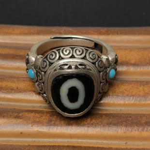 Chinese Silver Inlay DZI Agate Ring: Title: Chinese Silver Inlay DZI Agate RingDate/Period: Origin: Dimension: Weight 0.02 lbs/9gMaterials: Silver,DZI Agate Reserve: $299.00 Shipping:Domestic: Shipping rates are determined by