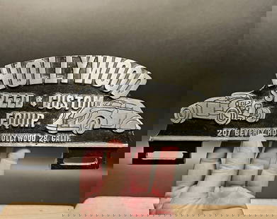 Aluminum Hollywood License Plate Fob Topper: 10 1/2" Wide x 4 1/2" Tall Wonderful reproduction license plate topper. Good detail aluminum, slightly aged to look like an antique. Certainly hard to tell its age. All our items come with a 100% cust
