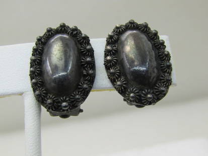 Vintage Sterling Silver Clip Earrings, 1930's-1940's, .75" Ovals: Vintage Sterling Silver Clip Earrings, 1930's-1940's, .75" Ovals, 5/8" wide with a floral halo - southwestern style flower-like design. These test as sterling or higher silver, but are not marked and