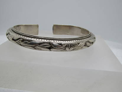 Vintage Heavy Sterling Cuff Bracelet, 8.5" Repousse, Unisex,: Vintage Heavy Sterling Cuff Bracelet, 8.5" Repousse, Unisex, This bracelet has a repousee scrolled domed design and is appx. 12mm wide and 7 mm thick. It has open ends at bhe back of the cuff. It has