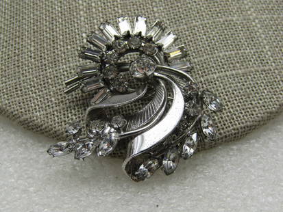 Vintage Sterling Rhinestone Star Brooch, 1940's-1960's, 1.25": Vintage Sterling Rhinestone Star Brooch, 1940's-1960's, 1.25" rectangular stones, pear-shaped, and rounf. Silver tone, art deco. Good condition, some wear on the finish on back. Not signed by the make