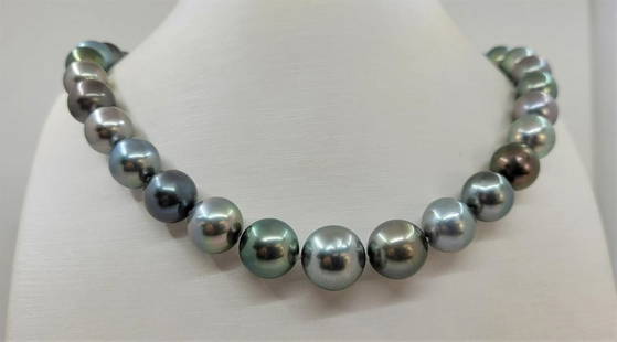 11x14mm Bright Multi Tahitian Pearls - Necklace: Title: 11x14mm Bright Multi Tahitian Pearls - Necklace Description: A stunning round multi-colored necklace of Tahitian pearls, selected for their shimmering peacock, silver and aubergine overtones, a