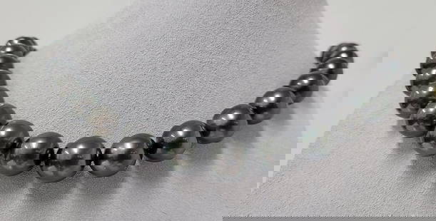 Large 11.2x13.5mm Peacock Black Tahitian Pearls - Necklace: Title: Large 11.2x13.5mm Peacock Black Tahitian Pearls - Necklace Description: A luxury pearl necklace, made with lustrous round Tahitian pearls, and completed with a solid invisible clasp. Tahitian p
