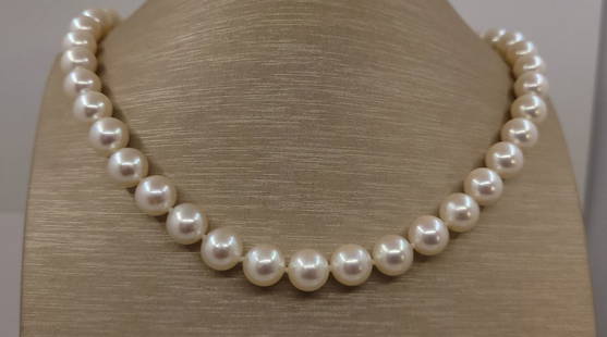 9.5x10mm Round Akoya Pearls - Necklace: Title: 9.5x10mm Round Akoya Pearls - Necklace Description: A beautiful pearl necklace of white saltwater AA Akoya pearls with exceptional lustre, finished with a solid silver clasp. The classic Akoya