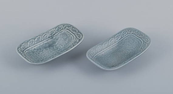 Gunnar Nylund for Rörstrand, two bowls in ceramic with glaze in gray tones.: Gunnar Nylund for Rörstrand, two bowls in ceramic with glaze in gray tones. From the 1960s. Marked. First factory quality. In perfect condition. Dimensions: W 17.2 cm x D 10.0 cm x H 4.0 cm. Rese