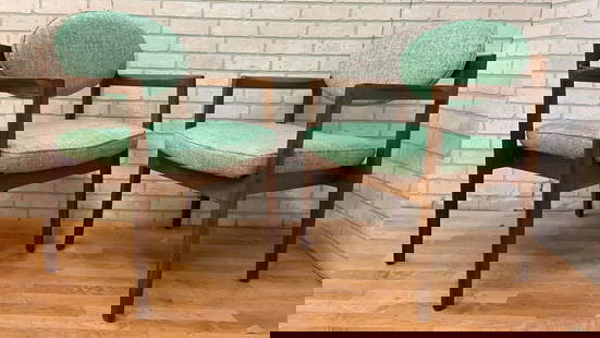 Mid Century Modern Armchairs 'Oval-Back' by Jens Risom - Pair: Mid Century Modern Armchairs 'Oval-Back' by Jens Risom - Pair The Mid Century Modern Armchairs, known as ‘Oval-Back,’ designed by Jens Risom and offered as a pair, are a stunning example o