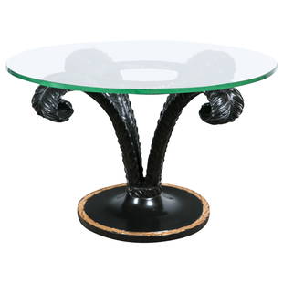 Hollywood Regency Style Ebonized Glass Top Palm Leaf Coffee Table Gilt Border: Title: Hollywood Regency Style Ebonized Glass Top Palm Leaf Coffee Table Gilt BorderDescription: Ebonized glass top palm leaf coffee table. The circular ebonized base with a fine gilt gold leaf