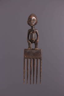 Luba comb - DRC ex-Zaïre - African Art Tribal Art: Title: Luba comb - DRC ex-Zaïre - African Art Tribal Art Date/Period: Second half 20th century Origin: DRC ex-Zaïre Dimension: 11,42 Inch Materials: wood Weight: 0,22 Pounds Item type: usual items,