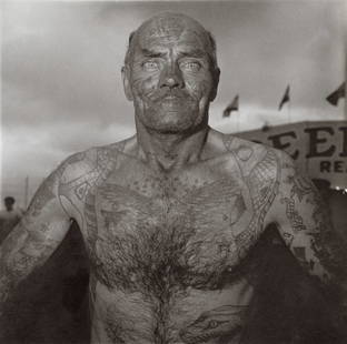 DIANE ARBUS - Tattooed Man At A Carnival, MD, 1970: Artist: Diane Arbus Title: Tattooed Man At A Carnival, MD, 1970 Medium: Photo Litho, 1972, USA Dimensions: 8.3x8.25" Description: Heat Wax Mounted on 11x14" Conservation Board Artist Bio: Diane Arbus