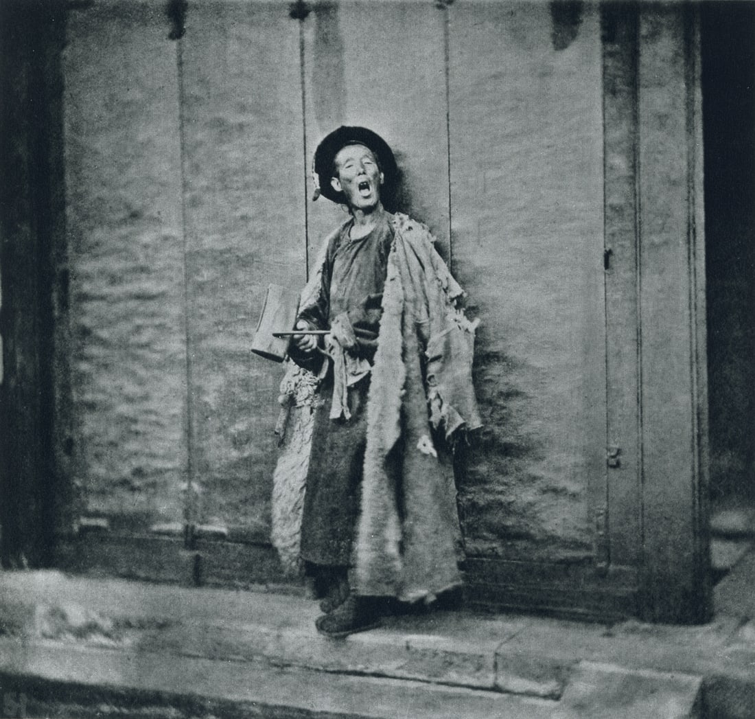JOHN THOMSON - Night Watchman, Peking, 1865: Artist: John Thomson Title: Night Watchman, Peking, 1865 Medium: Photo Litho, 1972, USA Dimensions: 6.7x6.4" Description: Heat Wax Mounted on 8.5x11" Conservation Board Artist Bio: John Thomson (1837