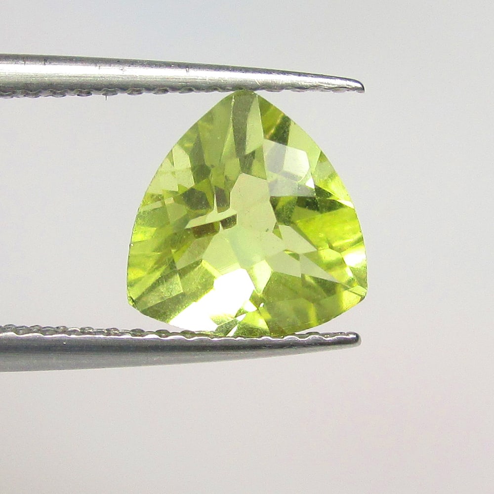 1.81 Ctw Natural Lemon Quartz Trillion Cut: No Reserve! Title: 1.81 Ctw Natural Lemon Quartz Trillion Cut Stone Clarity: VVS Gemstone:Natural Lemon Quartz Carat Weights: 1.81 Size/Dimensions: 8.50 x 8.40 x 5.90 mm Additional Info:Good Luster / 