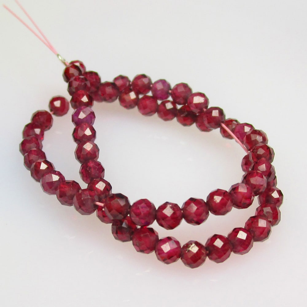 14.73 Ctw Natural 56 Drilled Garnet Round Beads: No Reserve! Title: 14.73 Ctw Natural 56 Drilled Garnet Round Beads Stone Clarity: Transparent Gemstone:Natural Garnet Beads Carat Weights: 14.73 Size/Dimensions: 3.10 to 3.20 mm / 56 PC's Additional I