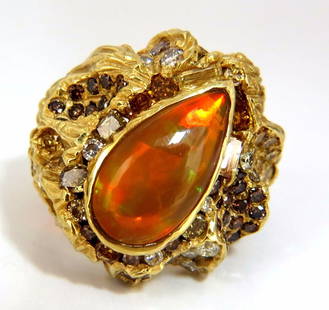 12.25ct natural opal diamonds ring 18kt Nugget Deco+: MAGNIFICENT JEWELS 6.00CT Natural Opal Ring. Cabochon Pear Shaped VS clean clarity Brilliant rays of orange, greens and some reds. A true holographic effect Opal is NOT a dublet 17 X 8 mm 6.25ct. diam