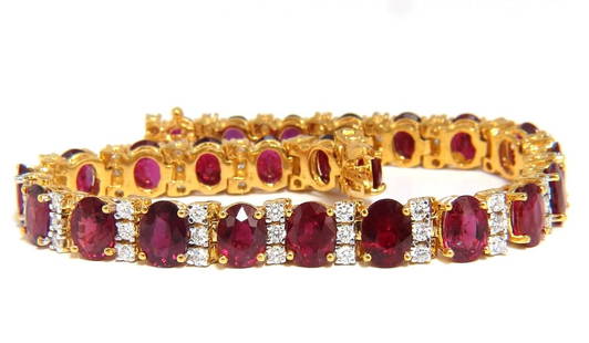 21.86ct NATURAL FINE VIVID RED RUBY DIAMONDS TENNIS BRACELET CLASSIC+: Classic Oval Tennis Bracelet 19.80ct. Natural Ruby Tennis Bracelet Red, Transparent & oval cut. Mozambique origin 6.8 X 5.3mm - 5.5 X 4.5mm Clean Clarity and very good cut. 2.05ct. diamonds: Rounds,