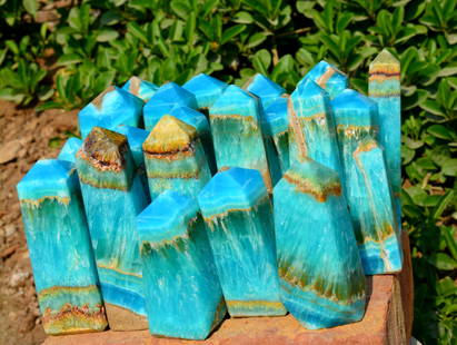 9 Kg Natural Color Top Quality Blue Aragonite with Smithsonite Towers: Title: 9 Kg Natural Color Top Quality Blue Aragonite with Smithsonite Towers Origin: Afghanistan Weight: 9 Kg Size/Dimensions: 8 CM to 14 CM Description: Natural Reserve: $3,600.00 Shipping: Domestic: