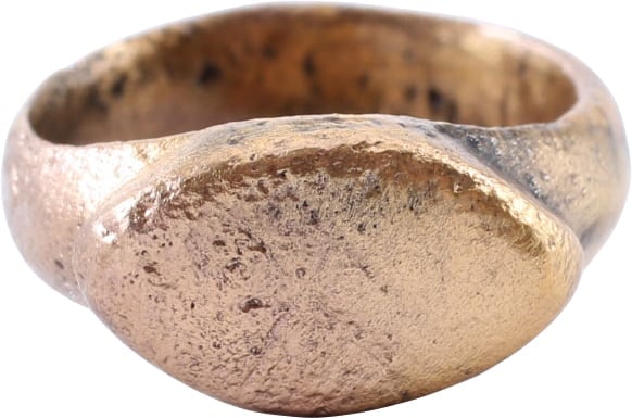 ROMAN RING C.4th-6th CENTURY AD, SIZE 2 ½: Size 2 ½ for wear on the small finger between the first two joints as was the custom. Oval form, gilt bronze with 2.1 mm rounded face band widened to 4.1mm at the bottom. The bottom also thickene