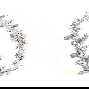 Authentic! Tiffany & Co Platinum Diamond Garland Bracelet: The Authentic Tiffany & Co. Platinum Diamond Garland Bracelet is a stunning piece of fine jewelry that features a delicate garland design set with dazzling diamonds. The bracelet is made of high-quali