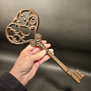 13" Cast Iron Large Ornate Skeleton Key: Title: 13" Cast Iron Large Ornate Skeleton KeyDescription: 13" Long 5 1/2" Wide Such a wonderful reproduction antique cast iron key! As you can see this key has a somewhat ornate shape. The entire