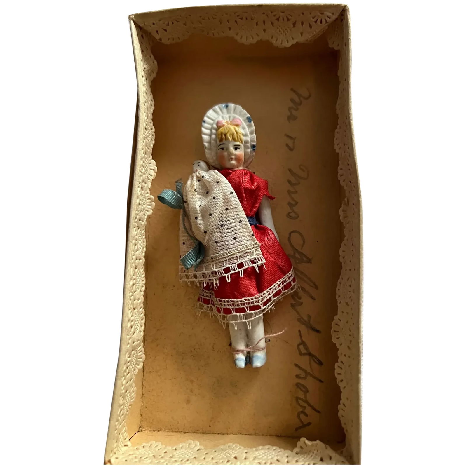 Antique all bisque bonnet doll holding baby 4" (1 of 7)