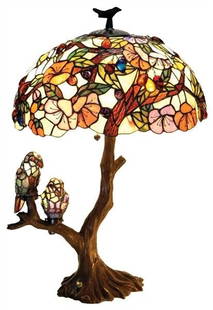 29" Tiffany Style Stained Glass Table Lamp: 29" Tall x 18" Stunning new reproduction lamp with two birds sitting on a branch as a base. Vibrantly colored shade. The two birds are each hand crafted, and can both be removed to put a 7 watt E12 bu